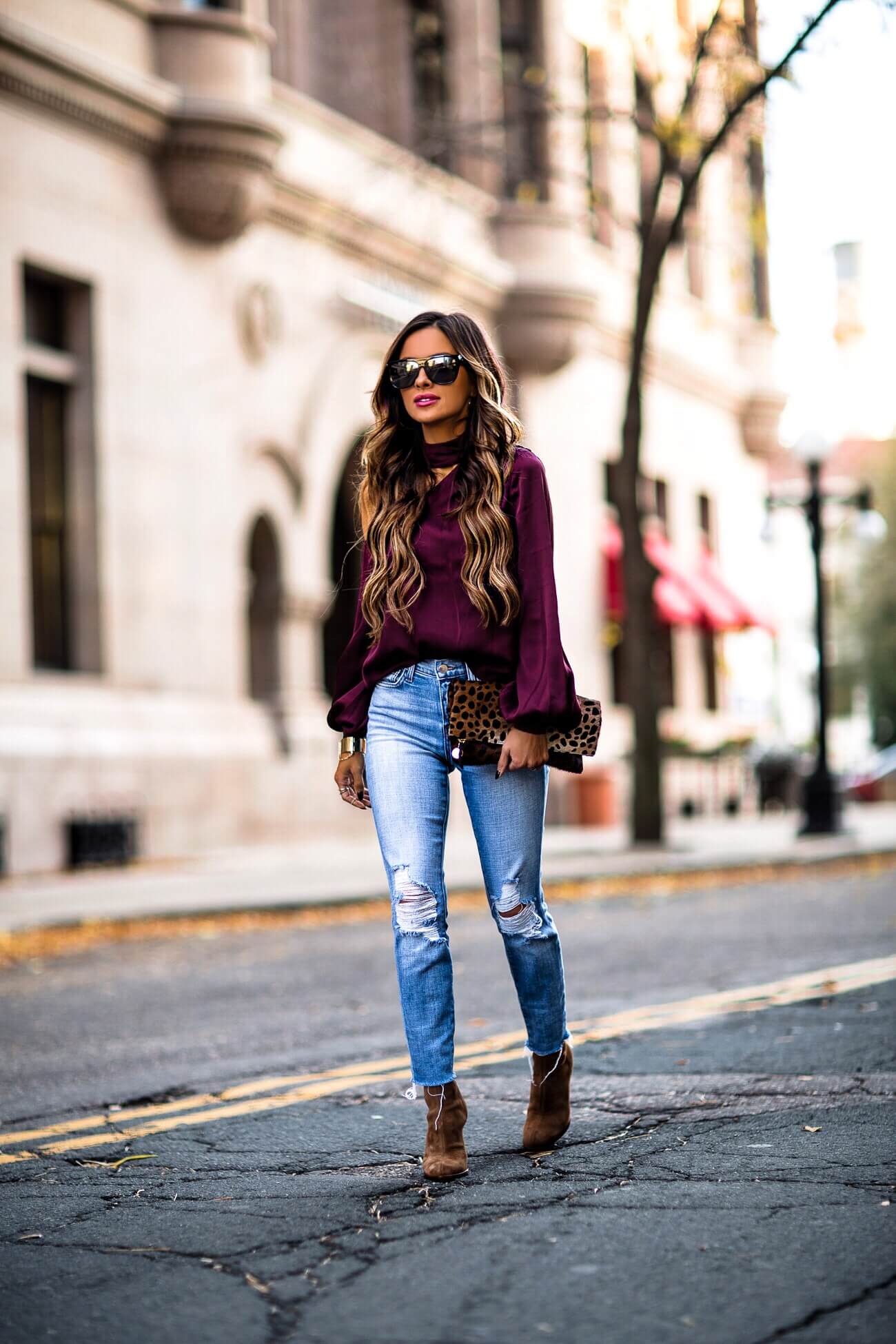 mn fashion blogger mia mia mine wearing a purple top from intermix