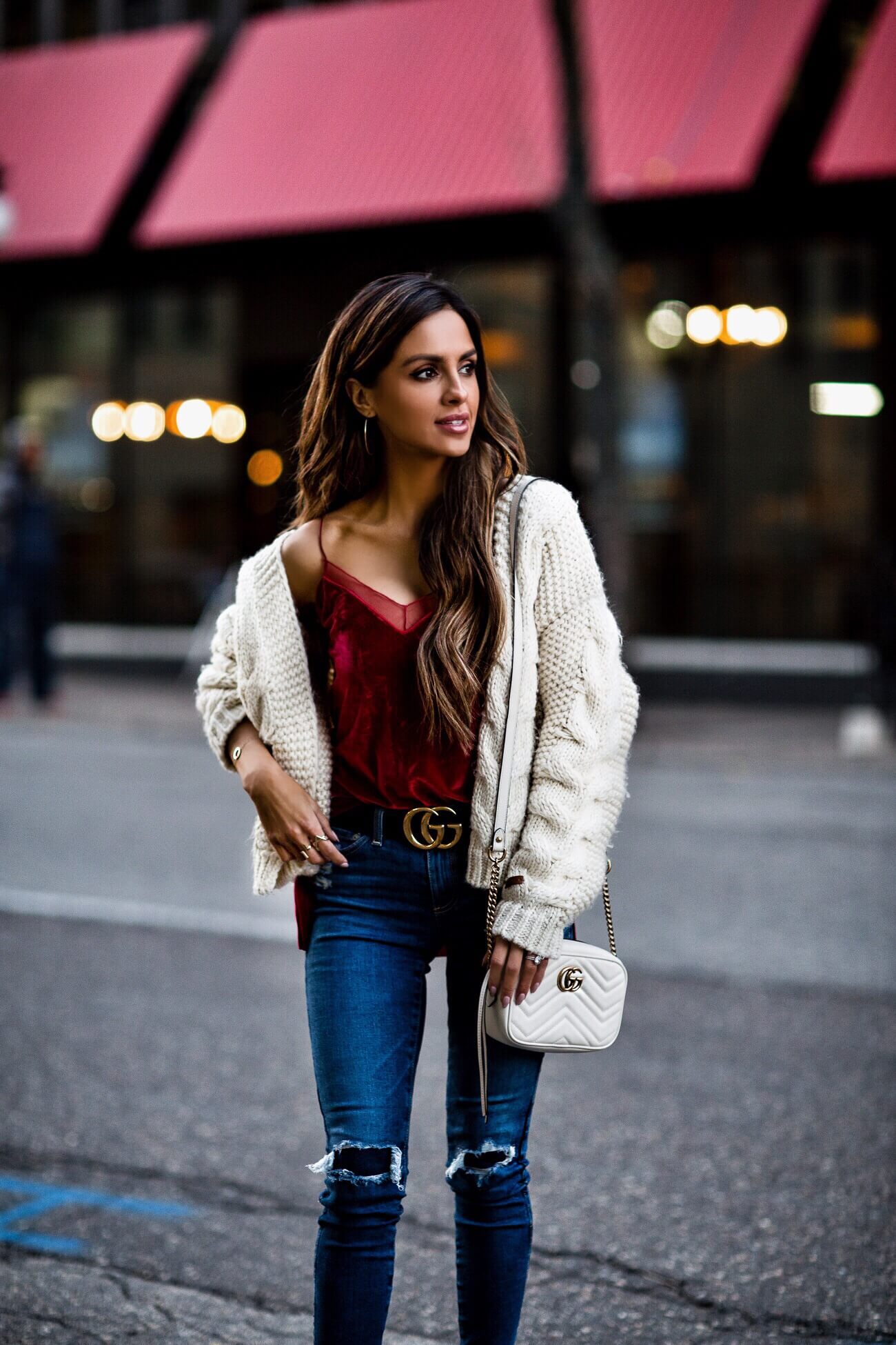 fashion blogger mia mia mine wearing a velvet cami and aurate delicate jewelry