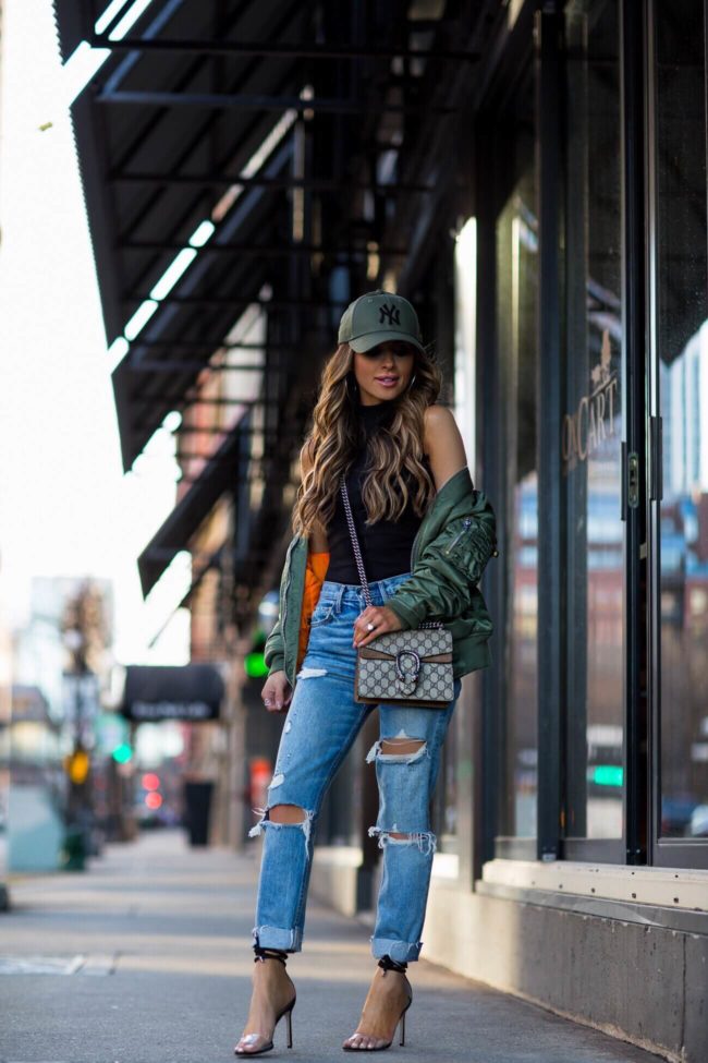 fashion blogger mia mia mine wearing jimmy choo heels and grlfrnd denim from revolve