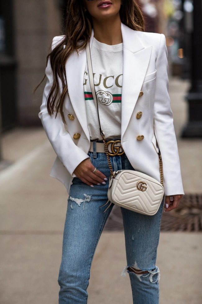 fashion blogger mia mia mine wearing a balmain blazer and a gucci belt