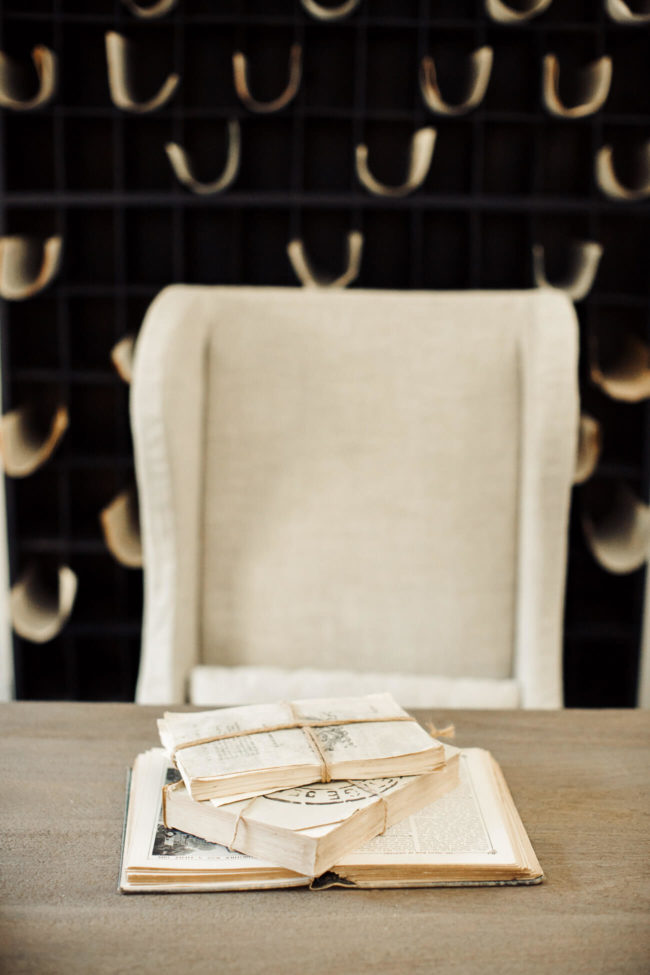 an Belgian wingback slipcovered arm chair featuring in mia mia mine's home office