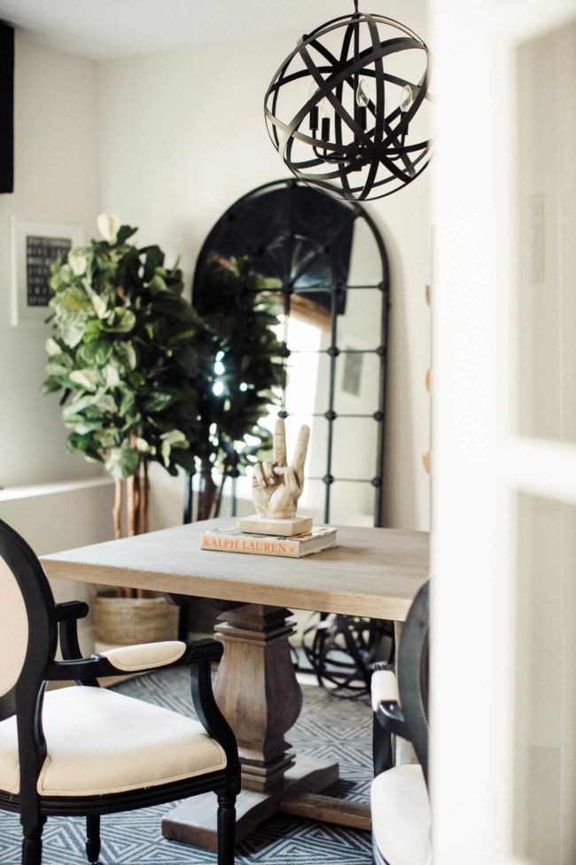 mia mia mine home office reveal featuring a fiddle leaf fig tree plant and z gallerie window pane mirror