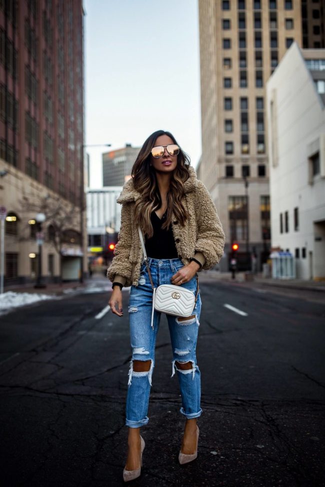 fashion blogger mia mia mine wearing grlfrnd denim and a white gucci bag