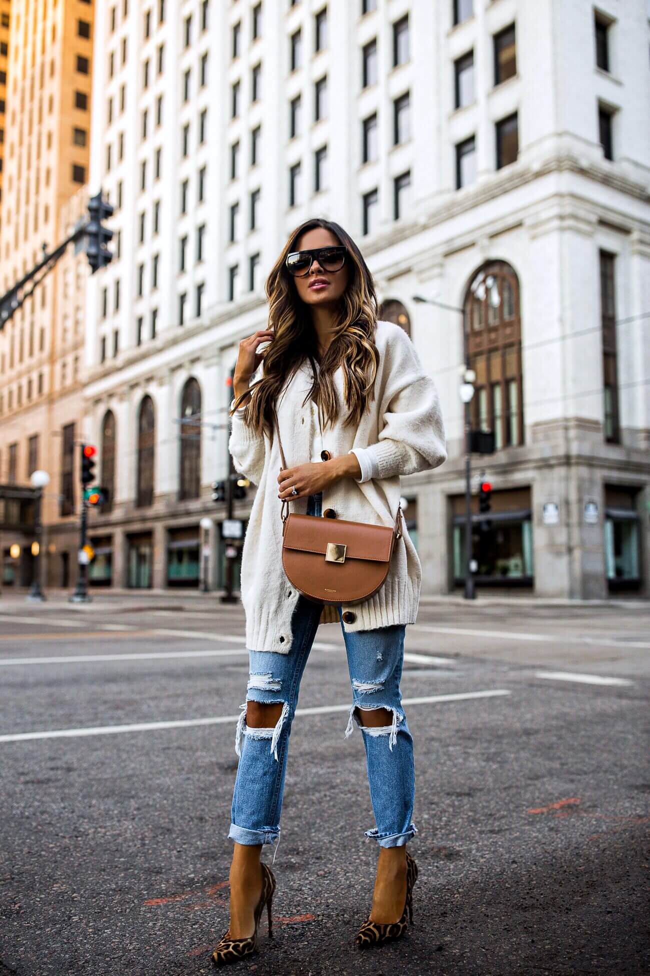 fashion blogger mia mia mine wearing grlfrnd denim from revolve and a white cardigan