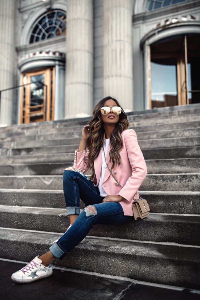 fashion blogger mia mia mine wearing a pink blazer by veronica beard from intermix