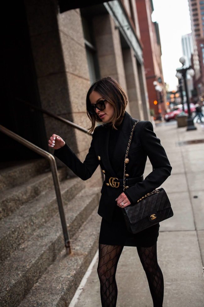 fashion blogger mia mia mine wearing a balmain blazer and a chanel bag