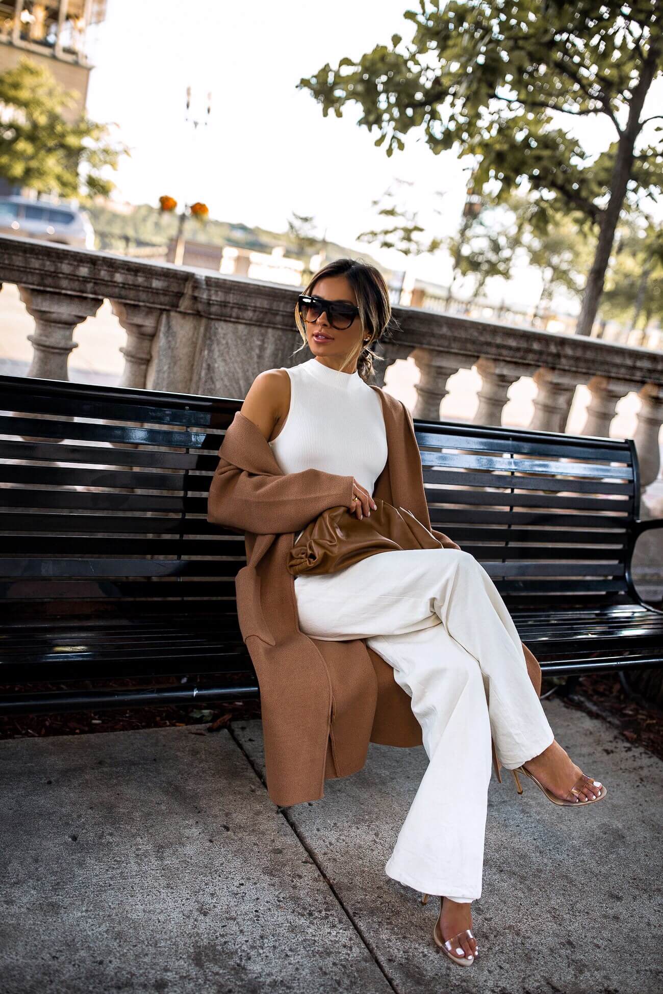 fashion blogger mia mia mine wearing a camel sweater coat from mango and a bottega veneta the pouch bag in camel