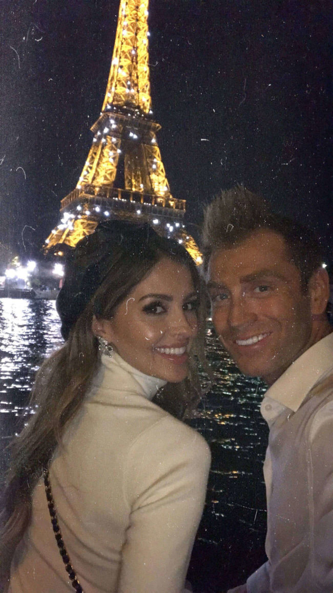 fashion blogger mia mia mine with husband phil at the eiffel tower in paris