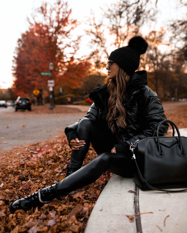 fashion blogger mia mia mine wearing a black outfit from express for fall