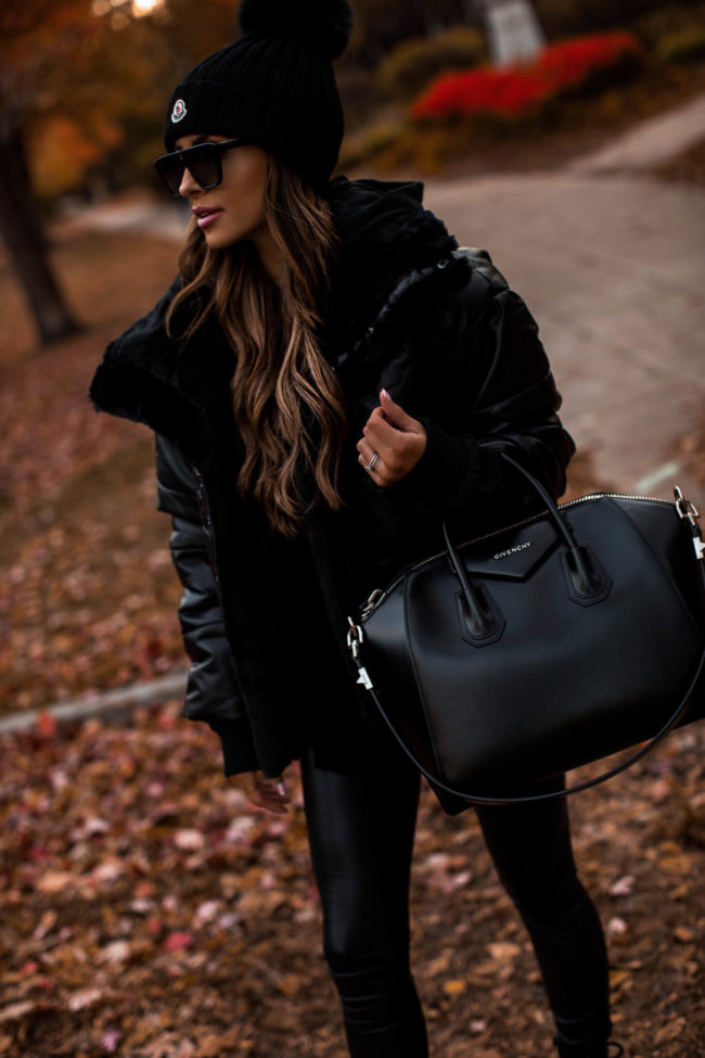 fashion blogger wearing a black outfit from express