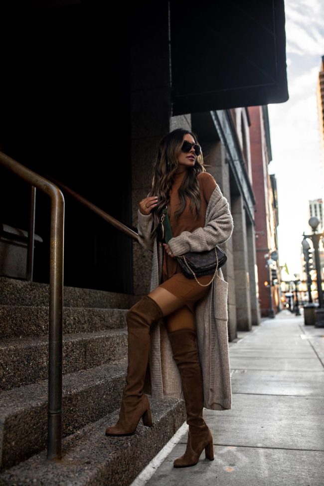 fashion blogger mia mia mine wearing a revolve sweater dress and cardigan