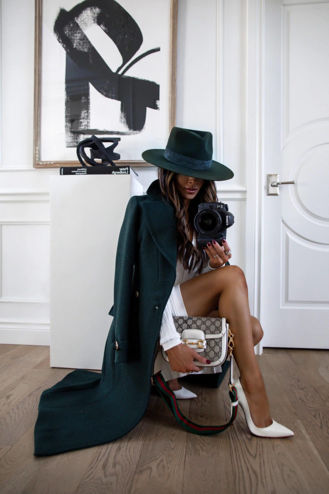 fashion blogger wearing a green wool coat from karen millen