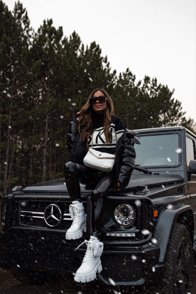 fashion blogger mia mia mine wearing white prada monolith boots from saks