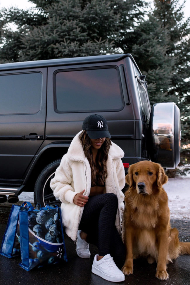 fashion blogger mia mia mine wearing a sherpa jacket from walmart 