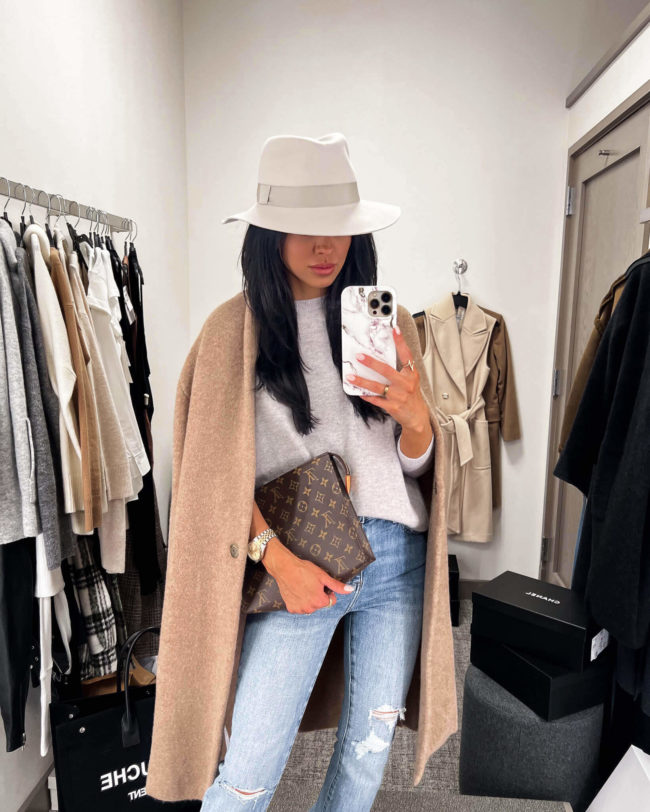 fashion blogger mia mia mine wearing a gray pullover cashmere sweater from the nordstrom anniversary sale 2022