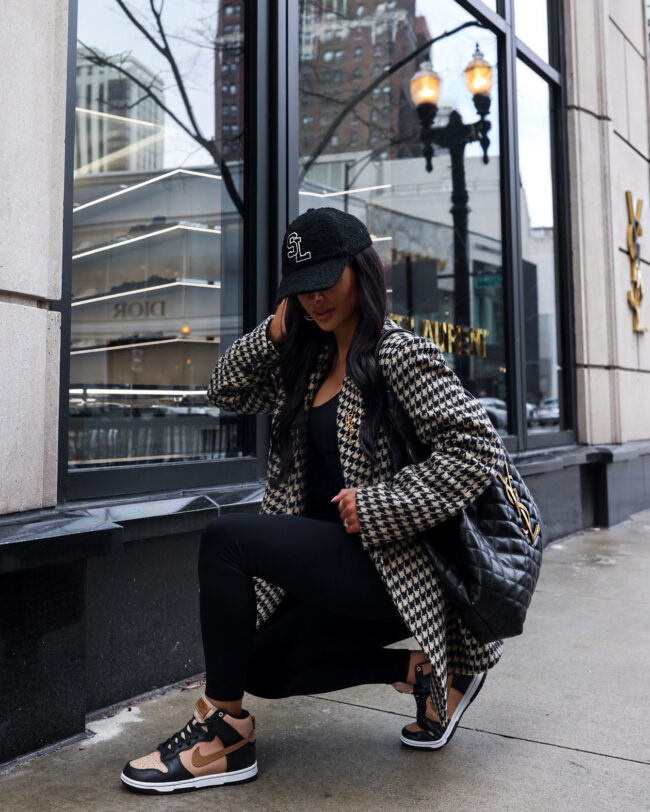 fashion blogger wearing nike dunk high sneakers