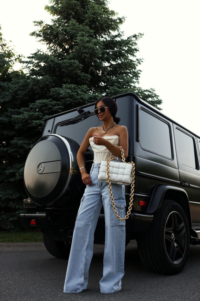 fashion blogger mia mia mine wearing baggy jeans from agolde