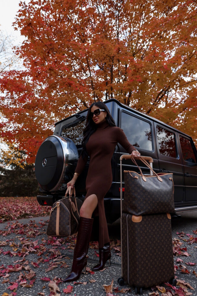 fashion blogger mia mia mine with louis vuitton luggage