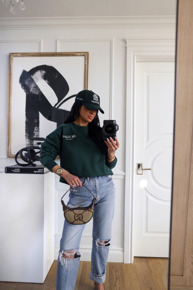 fashion blogger wearing a sporty & rich x the carlyle sweatshirt